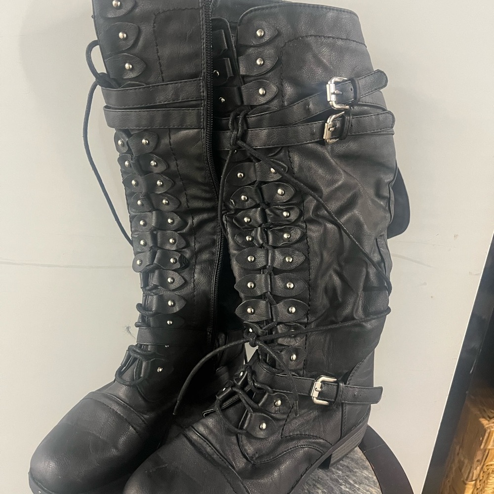 knee high lace up boots. Side zipper